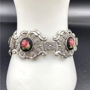 Silver Filagree bracelet with embroidered red roses on black background